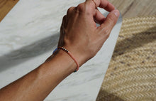 Load image into Gallery viewer, RANGI BRACELET THIN SINGLE BEAD STRAND BRACELET
